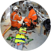 Image of two men wearing safety clothing